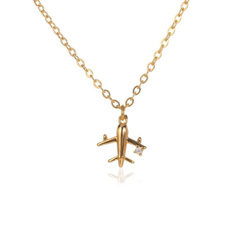 Gold airplane necklace with rhinestone