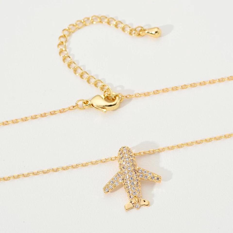 Gold bling airplane necklace