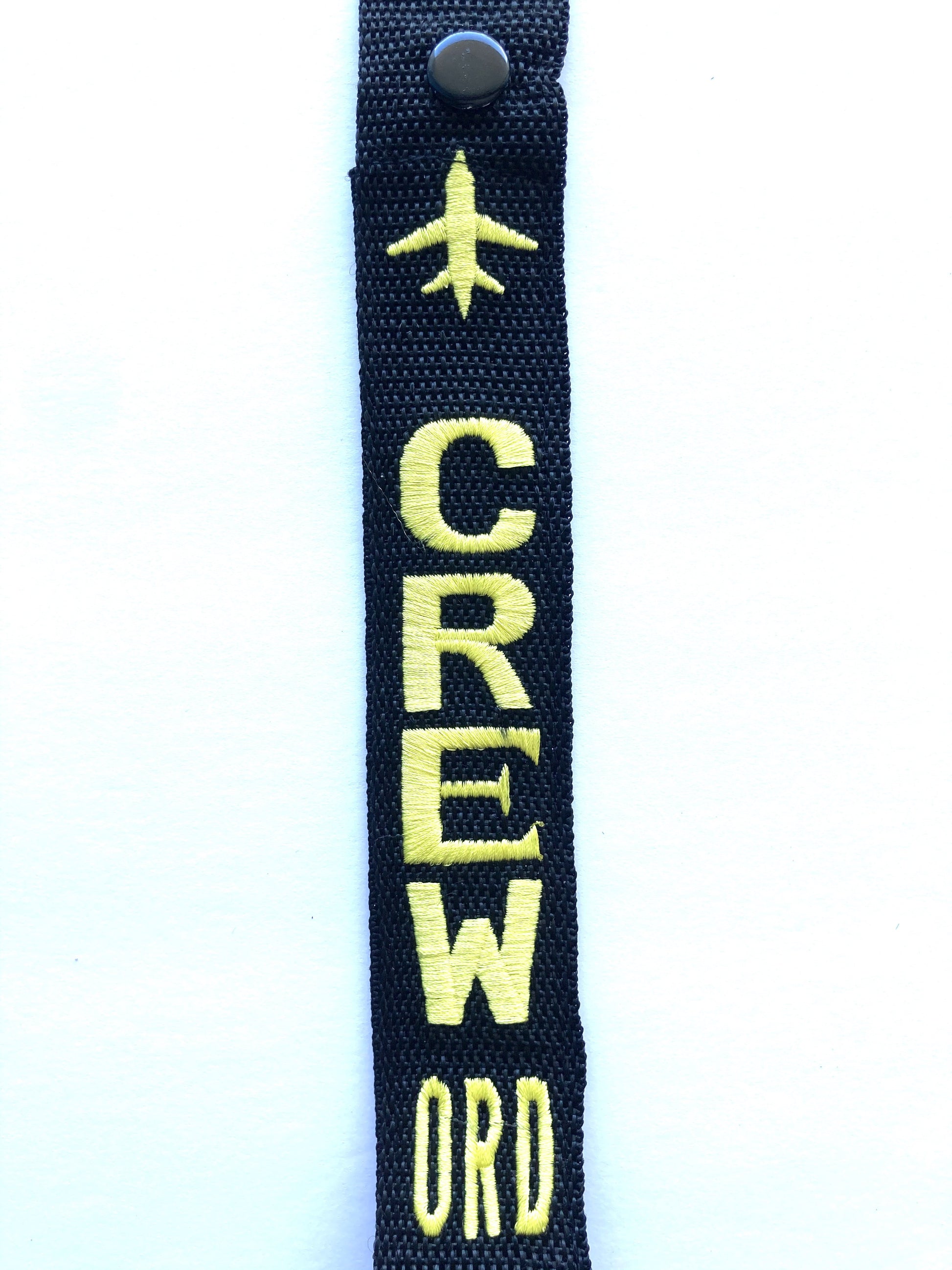 CREW Luggage Tag - ORD Yellow down