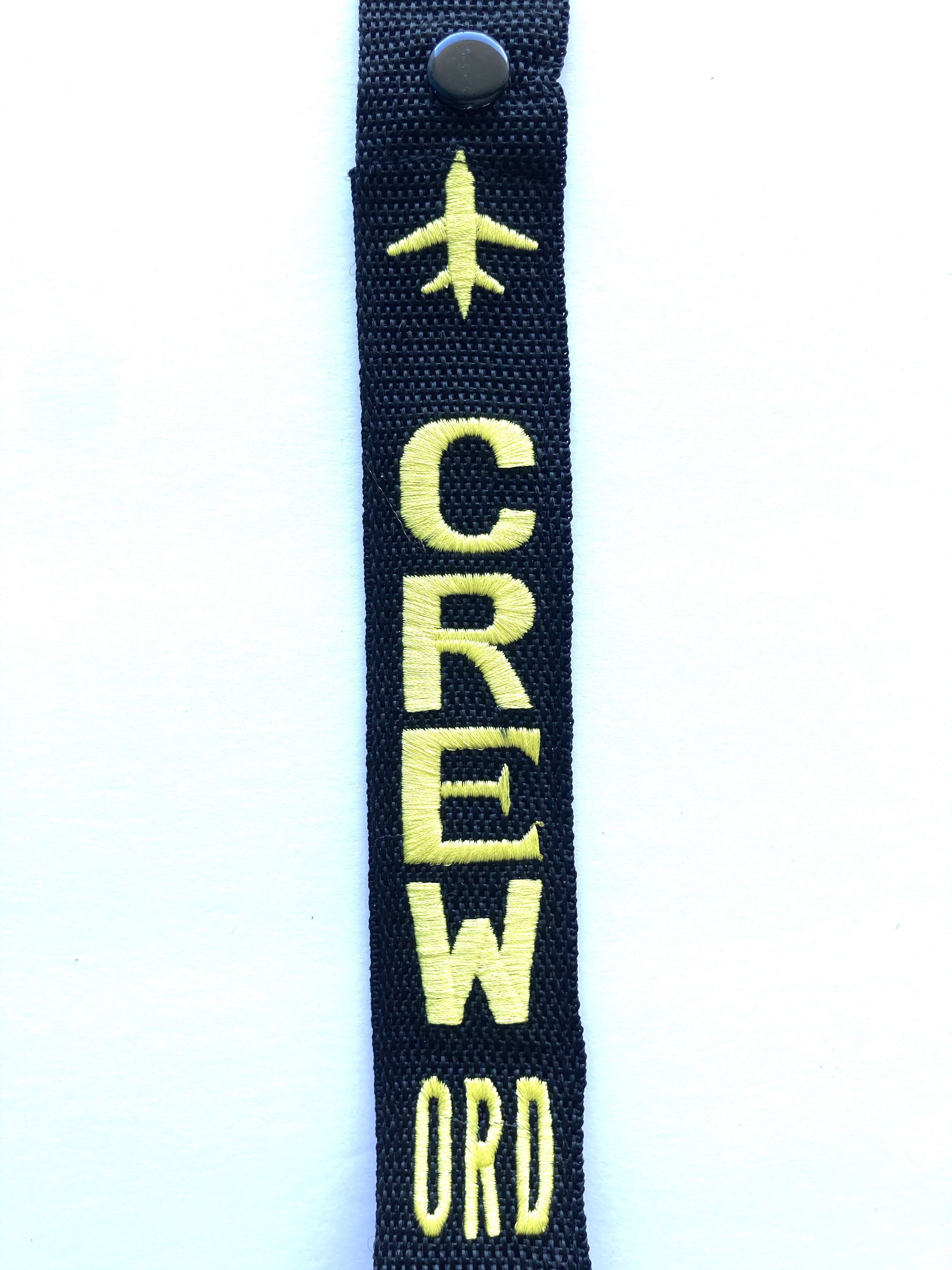CREW Luggage Tag - ORD Yellow down